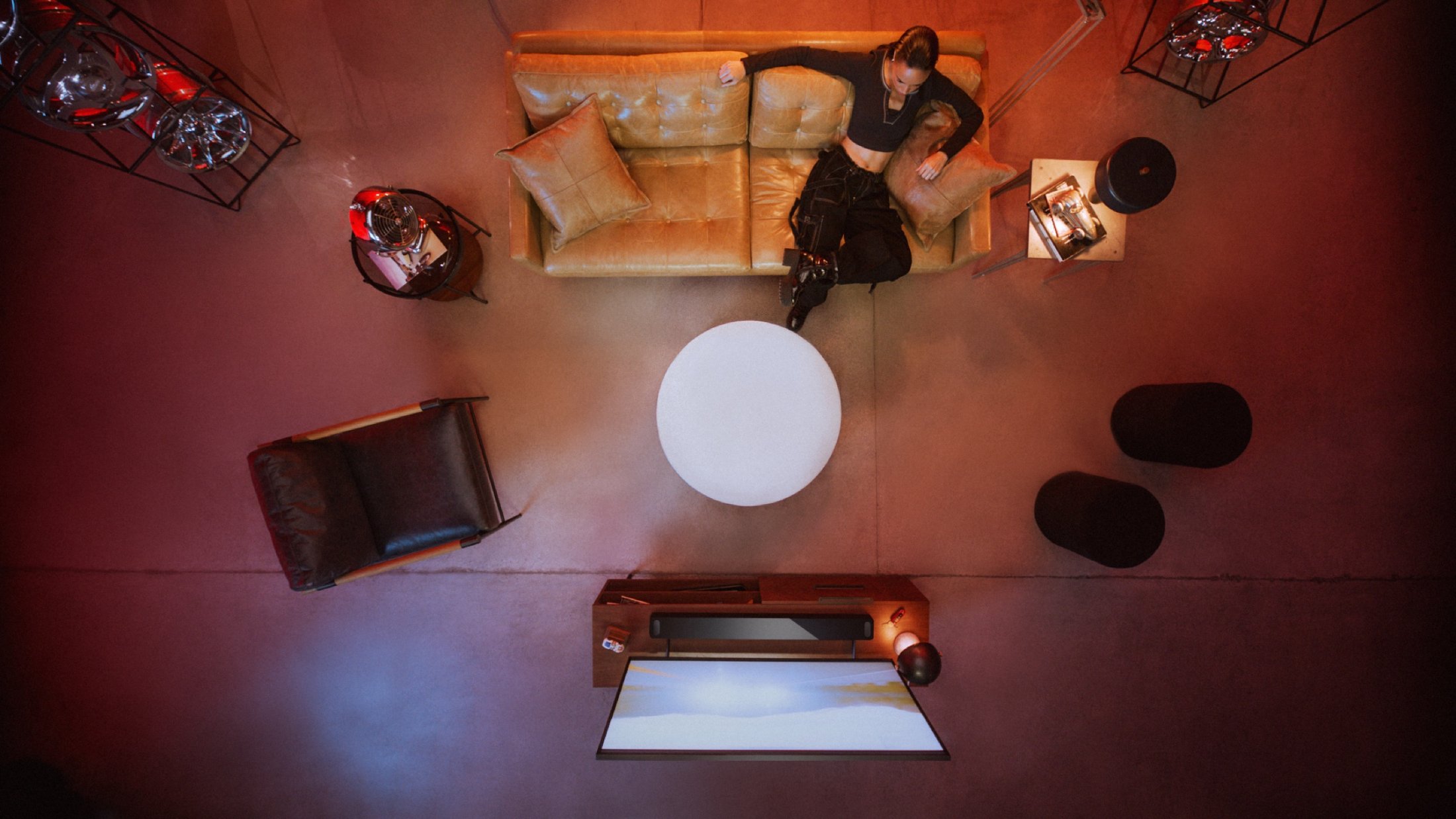 Overhead of the action-genre set, deep reds and a glowing orb
