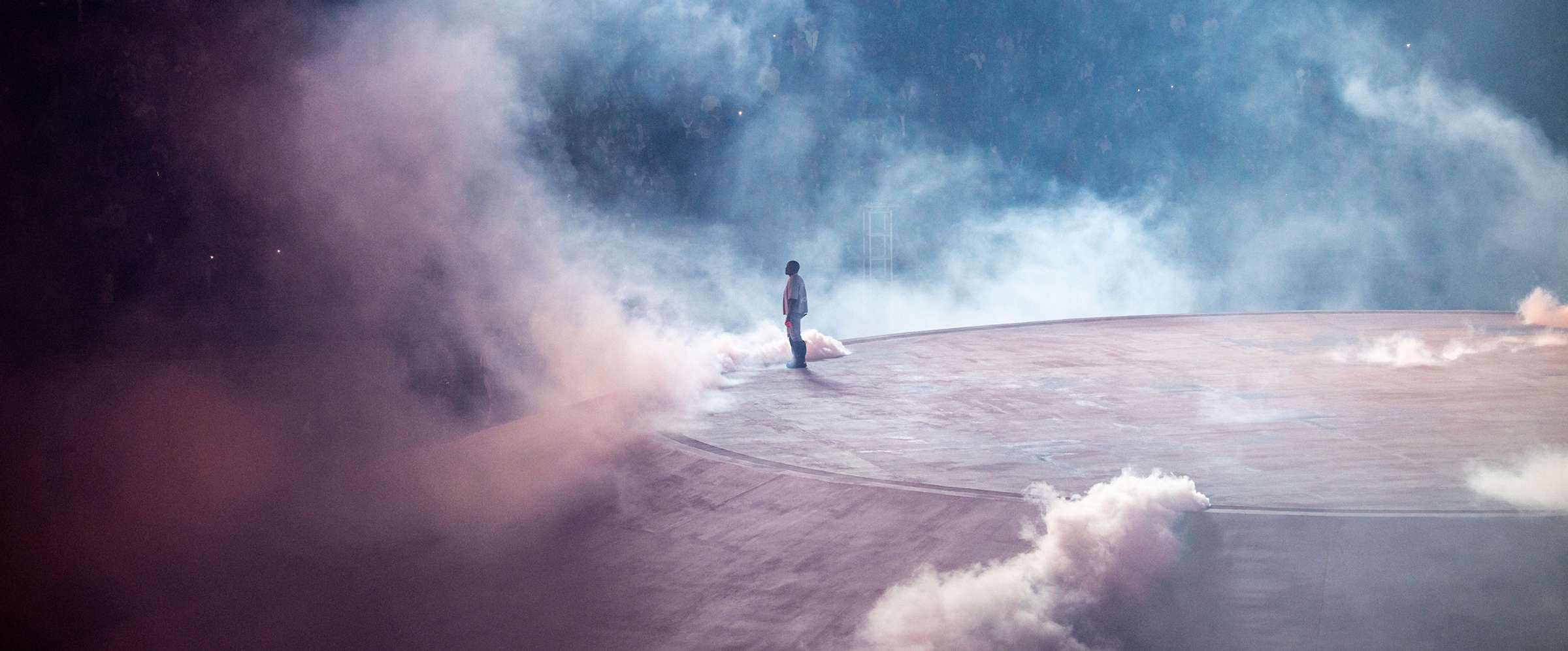 Free Larry Hoover benefit concert, lone figure on a vast stage in fog