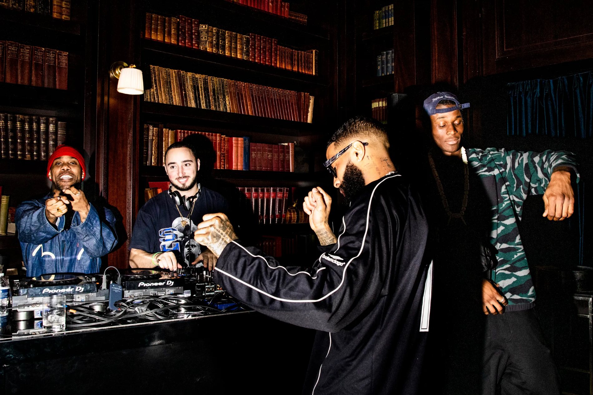 The DJ booth in the wood-panelled library, the room moving