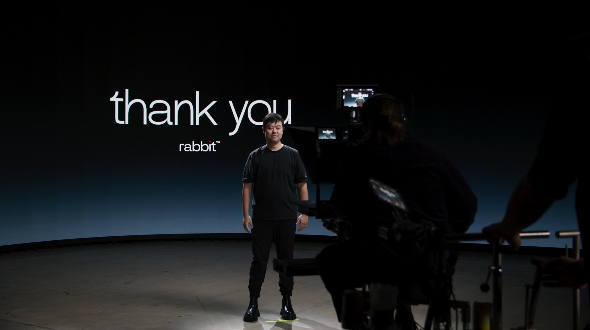 Jesse Lyu on the volume before a 'thank you, rabbit' end card, camera in foreground